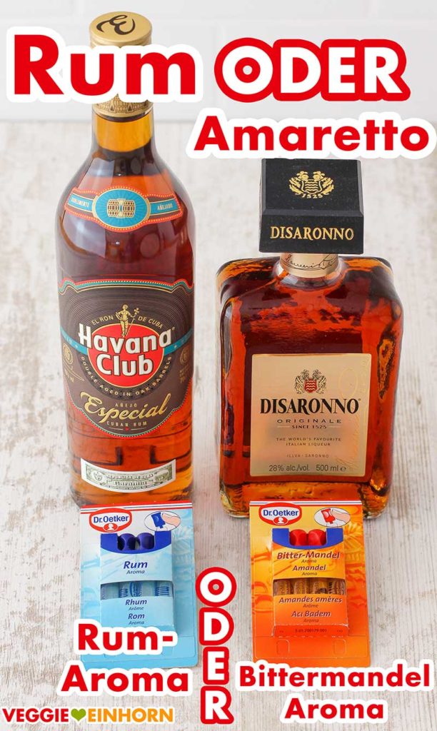 Eine Flasche Rum, eine Flasche Amaretto, zwei Packungen Backaroma Rum und Bittermandel