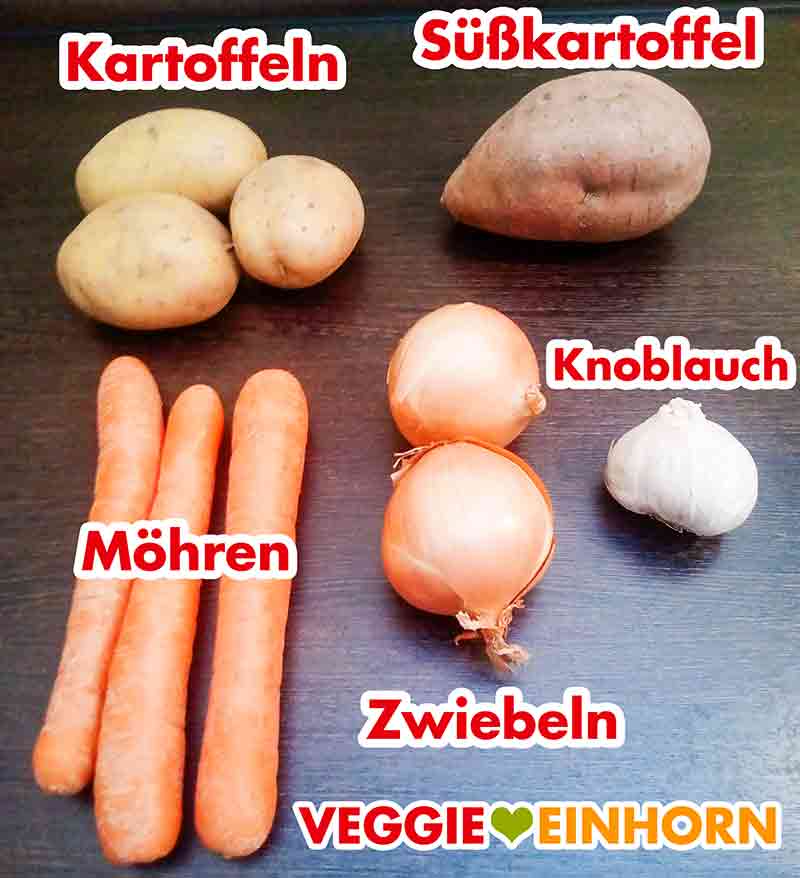 Kartoffeln, Süßkartoffel, Möhren, Zwiebel, eine Knolle Knoblauch