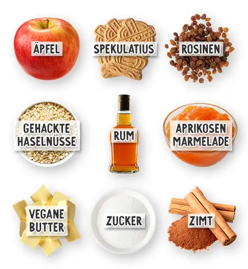 Zutaten für vegane Bratäpfel - Äpfel, Spekulatius, Rosinen, gehackte Haselnüsse, Rum, Aprikosenmarmelade, vegane Butter, Zucker und Zimt.