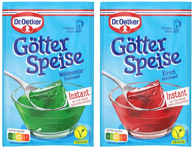 Zwei Packungen vegane Instant Götterspeise von Dr. Oetker (Waldmeister und Kirsch) mit Vegan Logo.